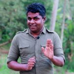 අමුතු විදිහම ආදරේ නම් ඒක එහෙමම තියේවා...! - "මැයි මාර ප්‍රසංගය" - "එයා කොහොම හරි මගේ කරගන්න ඕනි කියන එක දේශපාලනිකයි. එයා කොහේ හරි හොඳින් සතුටින් ඉන්න ඕන කියන එක විශ්වීයයි." ජීවන වීණාවෙන් වැයෙන බොහෝ ප්‍රේමණීය තාලයන් අතරේ හදවතක හරි පරිස්සමින් සුරකින, කවුරුත් නොදකින, මේක අමුතු විදිහේ ප්‍රේමයක්. කිසිදිනෙක හඬක් නොනැඟුණු අප්‍රකාශිත හැඟීම් දහස් ගණනක් මැද ඒකපාර්ශ්විකව එය දරා හිඳින්නට තරම් පරාර්ථකාමී වීම ලෙහෙසි පහසු දෙයක් නොවේ. එය ප්‍රේමයේ ගැඹුර කෙතරම් ද යන්න කියාපාන්නකි. එවන් ප්‍රේමයක් දරන හදවතක් උසුලන සියලු ප්‍රේම ආනිසංසයන් විටෙක ශාන්ත සුන්දරත්වයක් ඇති විඳීම් ය. නමුදු ඇතැම් විටෙක නිහඬ විඳවීම් ය. ඒ කරුණු කාරණා කෙසේ වුවත් ප්‍රේමය නම් ප්‍රේමයම වනු ඇත. කවදත් ලියන කලාවෙන් ආත්මයටම දැනෙන්නට ආමන්ත්‍රණය කරන මහින්ද ප්‍රසාද් මස්ඉඹුලයන්ගේ දෑතින් ලියැවුණු "මැයි මාර ප්‍රසංගය" නමැති නවකතාව ඇසුරින් නිර්මාණය වුණු "අමුතු විදිහම ආදරේ" නැතහොත් "මැයි මාර ප්‍රසංගය" නම් ගීතය, මහින්ද ප්‍රසාද් මස්ඉඹුලයන්ගේම අරුත්බර පද රචනාවට චතුර ගයාන් ජයනෙත්තිගේ අපූර්ව සංගීතය මුසු වී සුනීර සුමංගගේ ඉසියුම් හඬින් සහෘද හදවත් වෙත සමීප කර ඇති ප්‍රේමණීය ආමන්ත්‍රණයකි. "ඈත කන්දේ ගසක් සිටුවමි මල් පිපේවී කවද හෝ එහි එමල් ඔබහට පෙනී සිතට සතුටක් දැනේවා දැනේවා... දැනේවා..." ජීවන ගිරි දුර්ගය තරණය කරමින් යන අතරේ ජීවිතයට වසන්තය රැගෙන ආ නුඹ කෙරෙහි මගේ හදවත තුළ උපන් ප්‍රේමයේ නාමයෙන්, ඒ හැඟීම් සියල්ලක්ම පිවිතුරු ප්‍රාර්ථනාවක් ලෙසින් මේ වාතලයට මුදා හරිමි. කොහේ හෝ කවුරුත් නොදන්නා ඈතක මල් දරන ගසක් ලෙස එය පවතීවි. ඒ මම වග, මගේ ප්‍රේමය බව නුඹ කිසිදිනෙක දැන නොගනිවී. නමුත් ඒ පිපෙන මල් දැක, ඒ සුවඳින් නුඹේ හදවතට සතුට සැනසීම දැනේවා. කොහේ හෝ සතුටින් රැඳේවා! ඔබේ මුහුණේ සිනා සේයා මං නොදැක්කත් කමක් නෑ ඒක කන්දට පෙනේවා පෙනේවා.... පෙනේවා... ඒ කන්ද දෙස බලාගෙන මට ඉන්න ඉඩකඩ ලැබේවා... ලැබේවා.... ලැබේවා...... නුඹේ මුවෙහි ඇඳෙනා සිනා සේයා නුඹේ ළඟින් හිඳ දකින්නට මට නොහැකි වූවත් කමක් නැත. එහෙත් ඒ හැමදෙයක් දුරින් හිඳ හෝ මට විඳින්නට ලැබේවා! නුඹ තුටින් බව දැනෙන හැම විට මට සැනසීමක් දැනෙයි. මෙය ඒකපාර්ශ්වික ප්‍රේමයේ ගැඹුරු බව මනාව විදහා දක්වයි. වචන ස්වල්පයක් ඇතුළත විසල් අහසක් තරම් සිතුවිලි ගොන්නක් සඟවා තබා මෙම ගී පද හදවතේ සියුම් නිලයන් අල්ලා ගනියි. "මලෙක සුසුමත් සුසුමෙ ස්වරයත් ස්වරයෙ පැහැයත් වගේ අමුතු විදිහට සිතන්නට මම ඉගෙන ගත්තේ ඔබෙන් අමුතු විදිහම ආදරේ නම් ඒක එහෙමම තියේවා... තියේවා...තියේවා..." නුඹ නමින් මේ හදවතෙහි පිපෙන ප්‍රාර්ථනා මල්, සුසුම් ස්වරයන්, ඒ ස්වරයන් තුළින් මැවෙනා හදවතේ වර්ණ රටාවන් වල ඇති සුන්දරත්වය සේ අමුතු විදිහට හිතන්නට ඉගෙන ගත්තේ මා නුඹෙන් ය. එයත් හරියට පර නොවෙන පිවිතුරුම මැයි මාර මලක් වැනිය. පිපී සුවඳ දී හිනැහෙන නමුත් කිසිදිනෙක දෝතින් ගෙන අයිතියක් කීමට නොහැකි වූ ආදරණීයම හමුවීමක් ය. ඉතින්, මගේ එකම එක ප්‍රාර්ථනය නම් අයිතියක් කියන්නටත් නොහැකි, කවුරුත් නොදන්නා අමුතු විදිහේ ආදරේ එලෙස එහෙමම තියේවා...! මැයි මාර ප්‍රසංගයෙ හි එන සමිධ-සංචරණි ප්‍රේමය වගේම අමුතු විදිහේ ආදර කතා දහස් ගණනක් මේ අහස යට කෙතරම් නම් ඇති ද? ඒ වගේ හැඟීමකින් හිත පිරුණම කාලයත් එක්ක ඒ අමුතු විදිහේ ආදරේට බොහෝ අය ඇබ්බැහි වන්නේ නිරායාසයෙනි. ඉන් එහාට ඔවුන් ඒ ආදරේ එක්ක ජීවත් වෙන්න පටන් ගන්නා අතර සදාකාලෙටම හිත් ඇතුළේම ඒ ප්‍රේමයන් පරිස්සම් වී සැඟව යනවා. "මැයි මාර ප්‍රසංගය" ගීතය පුරාවට ම ඇත්තේ ඉතාමත් පිවිතුරු ප්‍රාර්ථනාවන් ය. ඒ ගීතය ම බලාපොරොත්තුවේ ආලෝකයක් ය. දැනටත් බොහෝ හදවත් තුළ සෙනෙහසින් දරා හිඳින සියල්ලක් අප්‍රකාශිත ඒකපාර්ශ්වික ප්‍රේමයන්ට සහ සියලු අහම්බකාරක හමුවීම් වලට මේ ගීතය තුළින් අරුතක් එක් කර ඇත. ඉතින්, මෙය ගැයෙන්නේ ඔවුනොවුන් කොහේ හෝ තැනක හොඳින්, සතුටින් ඇතැයි හිත සනසා ගත් සියලු විශ්වීය ප්‍රේමයන් වෙනුවෙනි. -නවෝද්‍යා ධනංජනී-